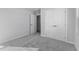 Bedroom with grey carpet and double door closet at 420 Charles Freer Ln, Whiteland, IN 46184