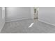 Bright bedroom with gray carpeting and access to bathroom at 420 Charles Freer Ln, Whiteland, IN 46184