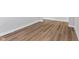 Clean hallway with wood-look flooring at 420 Charles Freer Ln, Whiteland, IN 46184