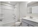 Clean bathroom with a gray vanity and a shower/tub combo at 432 Charles Freer Ln, Whiteland, IN 46184