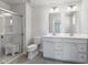 Modern bathroom with double vanity and shower at 432 Charles Freer Ln, Whiteland, IN 46184