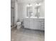 Modern bathroom with double vanity and shower at 432 Charles Freer Ln, Whiteland, IN 46184