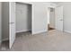 Bedroom with gray carpet, a closet, and access to the hallway at 432 Charles Freer Ln, Whiteland, IN 46184