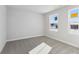 Spacious bedroom with gray carpeting and large windows at 432 Charles Freer Ln, Whiteland, IN 46184