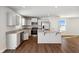Modern kitchen with stainless steel appliances and island at 432 Charles Freer Ln, Whiteland, IN 46184