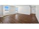 Bright living room with hardwood floors and large windows at 432 Charles Freer Ln, Whiteland, IN 46184