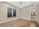 Bright bedroom features hardwood floors, ceiling fan, and natural light at 504 N Park N Ave # 4, Indianapolis, IN 46202