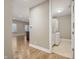 Entryway to Laundry Room featuring a stacked washer and dryer and a white cabinet at 504 N Park N Ave # 4, Indianapolis, IN 46202
