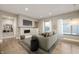 Spacious living room with fireplace and light wood floors at 504 N Park N Ave # 4, Indianapolis, IN 46202