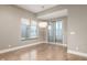 Open living area with hardwood floors and sliding glass door at 504 N Park N Ave # 4, Indianapolis, IN 46202