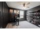 Unique bedroom with dark walls, Star Wars posters, and a display case for collectibles at 5573 Mahogany Dr, Noblesville, IN 46062