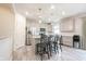 Modern kitchen with granite countertops, stainless steel appliances, and a center island at 5573 Mahogany Dr, Noblesville, IN 46062