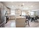 Open concept living area with kitchen, dining area, and living room visible at 5573 Mahogany Dr, Noblesville, IN 46062