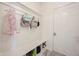 Practical mudroom with built-in bench, storage cubbies and white wood paneling at 5573 Mahogany Dr, Noblesville, IN 46062