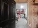View of an organized storage room with shelving, containers, and visible insulation at 5573 Mahogany Dr, Noblesville, IN 46062
