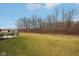 Spacious backyard with a patio set, perfect for outdoor entertaining and relaxation at 10008 Sundley Dr, Indianapolis, IN 46239