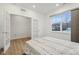 Bright bedroom boasts a walk-in closet and large window at 10008 Sundley Dr, Indianapolis, IN 46239