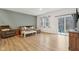 Bright living area with sliding door to a patio and stylish, neutral decor at 10008 Sundley Dr, Indianapolis, IN 46239