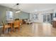 Bright, open living space with a modern dining area and comfortable seating arrangement at 10008 Sundley Dr, Indianapolis, IN 46239