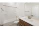 This bathroom includes a shower-tub combination and modern finishes at 15846 Vitalize Run, Fishers, IN 46040