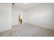 This bedroom has neutral carpeting and an open doorway to an ensuite bathroom at 15846 Vitalize Run, Fishers, IN 46040