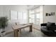 Stylized home office featuring a modern desk, comfortable seating, and elegant decor for productivity at 15846 Vitalize Run, Fishers, IN 46040
