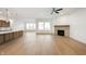 Modern open-concept living space seamlessly integrates the kitchen, living, and dining areas for entertaining at 15846 Vitalize Run, Fishers, IN 46040