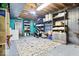 Spacious basement with ample storage, shelving, and potential for customization to suit various needs at 6906 Johnson Rd, Indianapolis, IN 46220