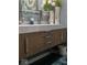 Modern bathroom vanity with sleek countertops, stylish faucets, and ample storage space at 6906 Johnson Rd, Indianapolis, IN 46220