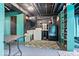 Functional laundry room with modern appliances, utility sink, and storage for efficient household tasks at 6906 Johnson Rd, Indianapolis, IN 46220