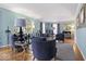 Bright living room featuring hardwood floors, stylish decor and comfortable, contemporary seating at 6906 Johnson Rd, Indianapolis, IN 46220