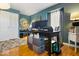 Functional home office space featuring a large desk and built-in storage at 6906 Johnson Rd, Indianapolis, IN 46220