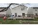 The backyard shows a well sized deck attached to the home at 5325 Bluff View Dr, Indianapolis, IN 46217