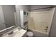 Cozy bathroom featuring a toilet, a shower with a curtain, and a vanity with a sink at 5325 Bluff View Dr, Indianapolis, IN 46217