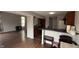 View from the living room into the kitchen and breakfast bar at 5325 Bluff View Dr, Indianapolis, IN 46217