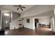 Open concept living room, with hardwood floors, leading to the kitchen at 5325 Bluff View Dr, Indianapolis, IN 46217