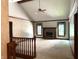 Bright living room featuring vaulted ceilings, a fireplace, and large windows with decorative curtains at 1079 Old Eagle Way, Greenwood, IN 46143
