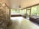 Screened porch with brick and tile featuring large screened openings to the backyard at 1079 Old Eagle Way, Greenwood, IN 46143