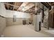 Unfinished basement utility area with water heater, furnace, and other utilities at 53 Hampstead Ct, Westfield, IN 46074