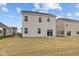 Rear view of home with a sliding glass door leading to the backyard at 1833 James Pierce Dr, Shelbyville, IN 46176