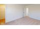 Bedroom featuring neutral carpet, white walls, and closet with shelving at 1833 James Pierce Dr, Shelbyville, IN 46176