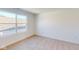 Sunlit carpeted bedroom featuring a large window for great views at 1833 James Pierce Dr, Shelbyville, IN 46176