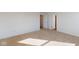 Spacious carpeted bedroom with neutral tones, carpet flooring, and walk in closet at 1833 James Pierce Dr, Shelbyville, IN 46176