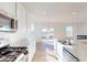 Modern kitchen with stainless steel appliances, a center island and marble countertops at 1833 James Pierce Dr, Shelbyville, IN 46176