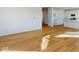Hardwood floors lead to bright open kitchen in this modern home at 1833 James Pierce Dr, Shelbyville, IN 46176