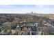 A neighborhood aerial view highlighting the skyline in the background during daylight hours at 1429 Brookside Pkwy N Dr, Indianapolis, IN 46201