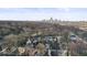 Aerial view showcasing the cityscape and neighborhood homes of this listing at 1429 Brookside Pkwy N Dr, Indianapolis, IN 46201
