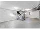 Spacious basement with painted walls and ceiling features overhead lighting at 1429 Brookside Pkwy N Dr, Indianapolis, IN 46201