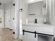 Modern bathroom with a vanity and granite countertop at 1429 Brookside Pkwy N Dr, Indianapolis, IN 46201