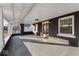 Spacious covered porch with modern lighting and stylish architectural details at 1429 Brookside Pkwy N Dr, Indianapolis, IN 46201